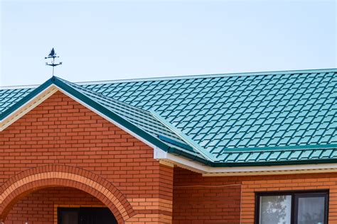 brick house with metal roof pics|matching brick and roof colors.